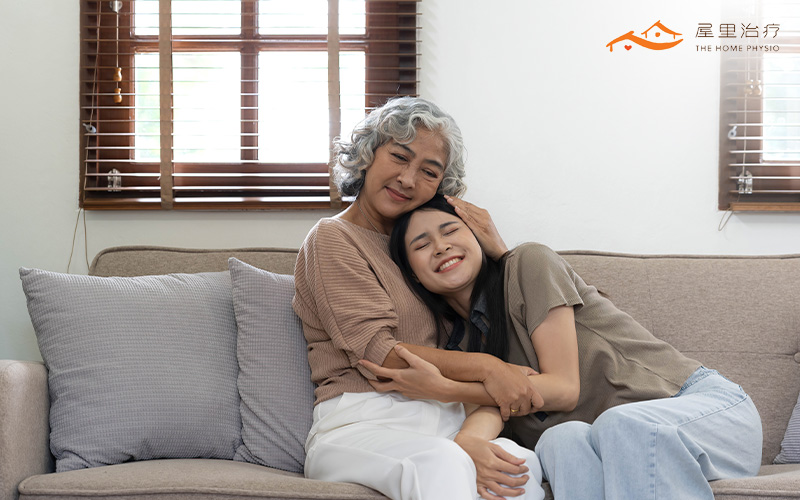 woman hugging her elderly loved ones