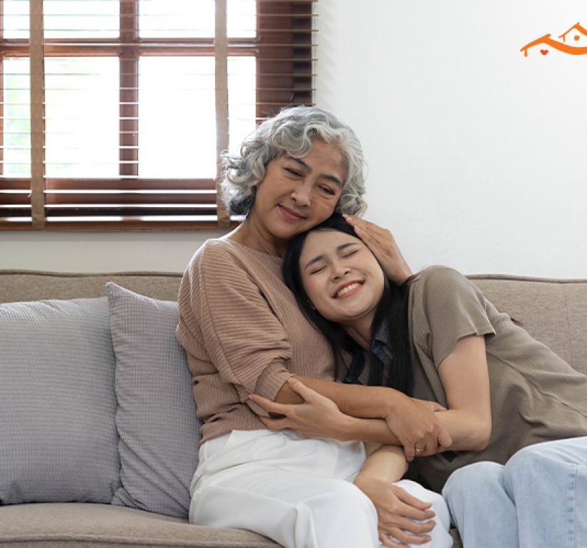 woman hugging her elderly loved ones